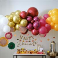Balloon Arch with Patterned Fans and Tealights
